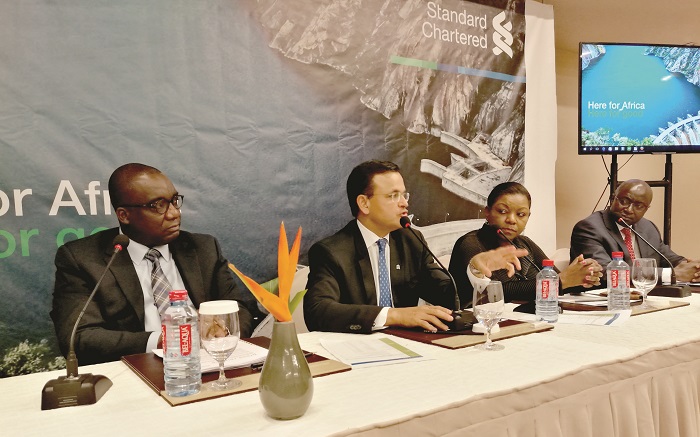 Mr Bedu Addo (left) with other colleagues from Stanchart at the news conference to announce the bank's 'Here for Africa' campaign. Mr Bedu Addo (left) with other colleagues from Stanchart at the news conference to announce the bank's 'Here for Africa' campaign.